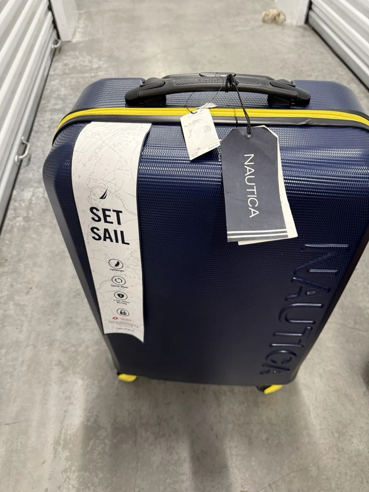 Equipaje giratorio rígido Nautica Marina 25" en azul marino/amarillo ORG $320 Excelente Co Foto 3 de 4