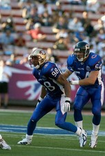 Julian Peterson NFC in action v the AFC at the NFL Pro Bowl Game o- 2004 Photo 5