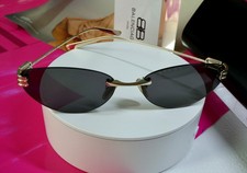 Ever spectacular, Balenciaga women sunglasses oval shape frame color gold and bl