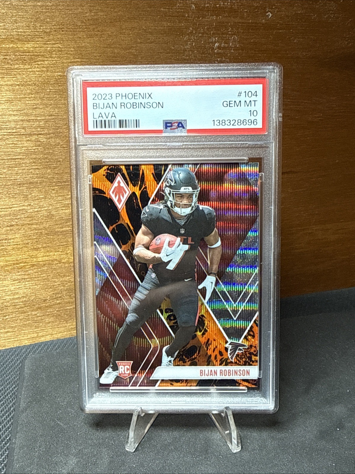 2023 Panini Phoenix - Rookies Bijan Robinson #104 Lava /175 (RC)