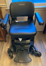 electric wheelchair-New-By Pride -complete with Battery and charger