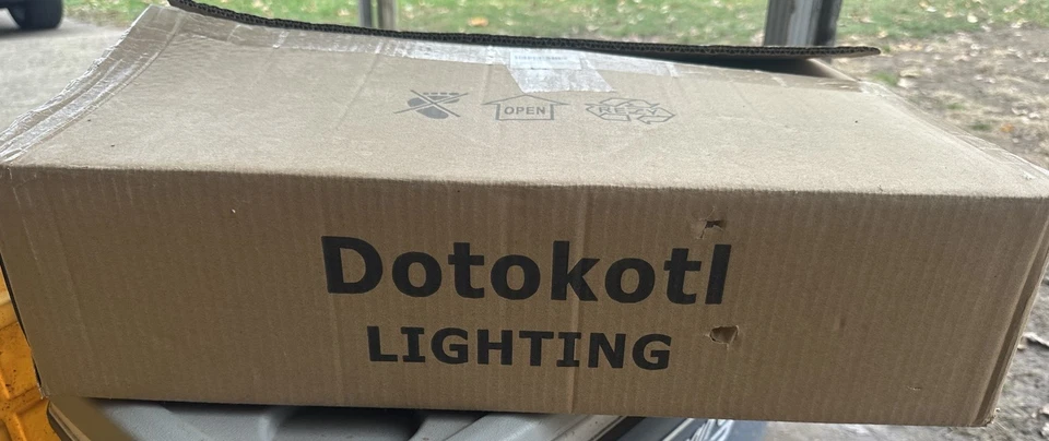 Lámpara de araña de bronce para decoradores del hogar diseño esférico Foto 2 de 4