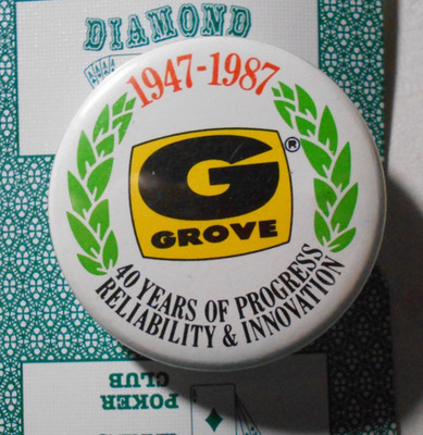 AD0519: Grove 40 years progress reliability innovation cello pinback button