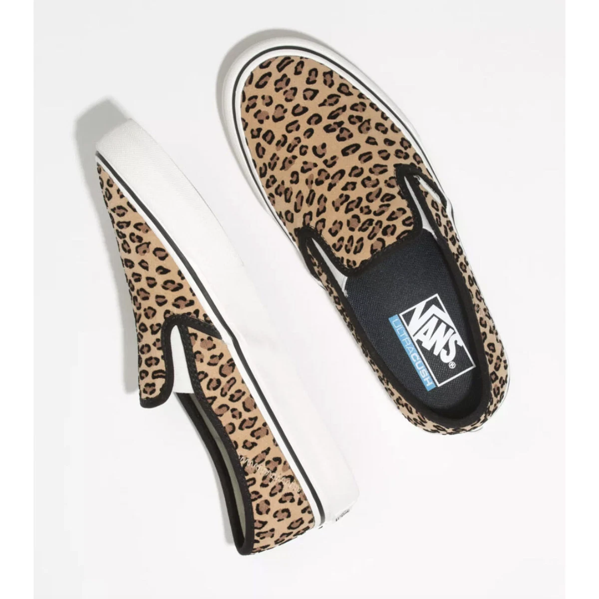 Vans mini shop leopard slip on