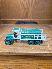 Vintage. Conoco Continental oil company metal oil truck piggy bank.