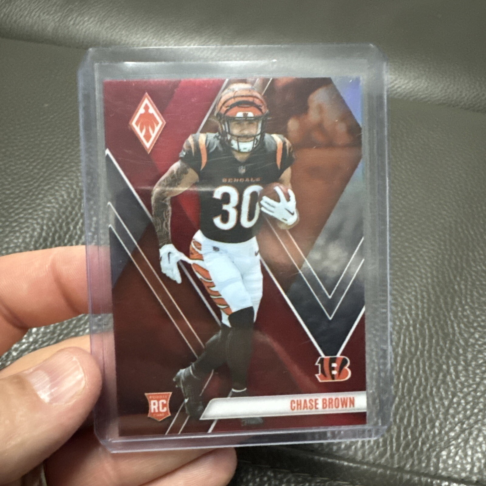 2023 Panini Phoenix - Rookies Red #133 Chase Brown /250 (RC)