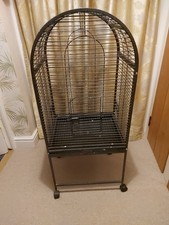 Large Bird Cage with Wheeled Stand. Has been used but is clean.