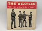 Beatles, She Loves You 45 rpm with photo sleeve, Swan S-4152