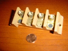 Electrical terminal block 4 place 4 x 1 1/2 x 1 1/4 brass heavy duty new 
