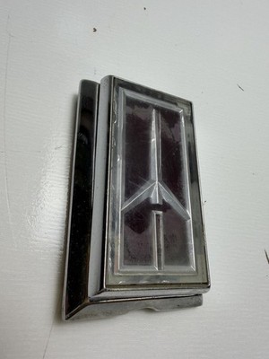 1980-1985 Oldsmobile Delta 88 Royale Trunk Lock Flipper Emblem OEM 20177731