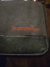 Vintage technophone.Car phone In black bag