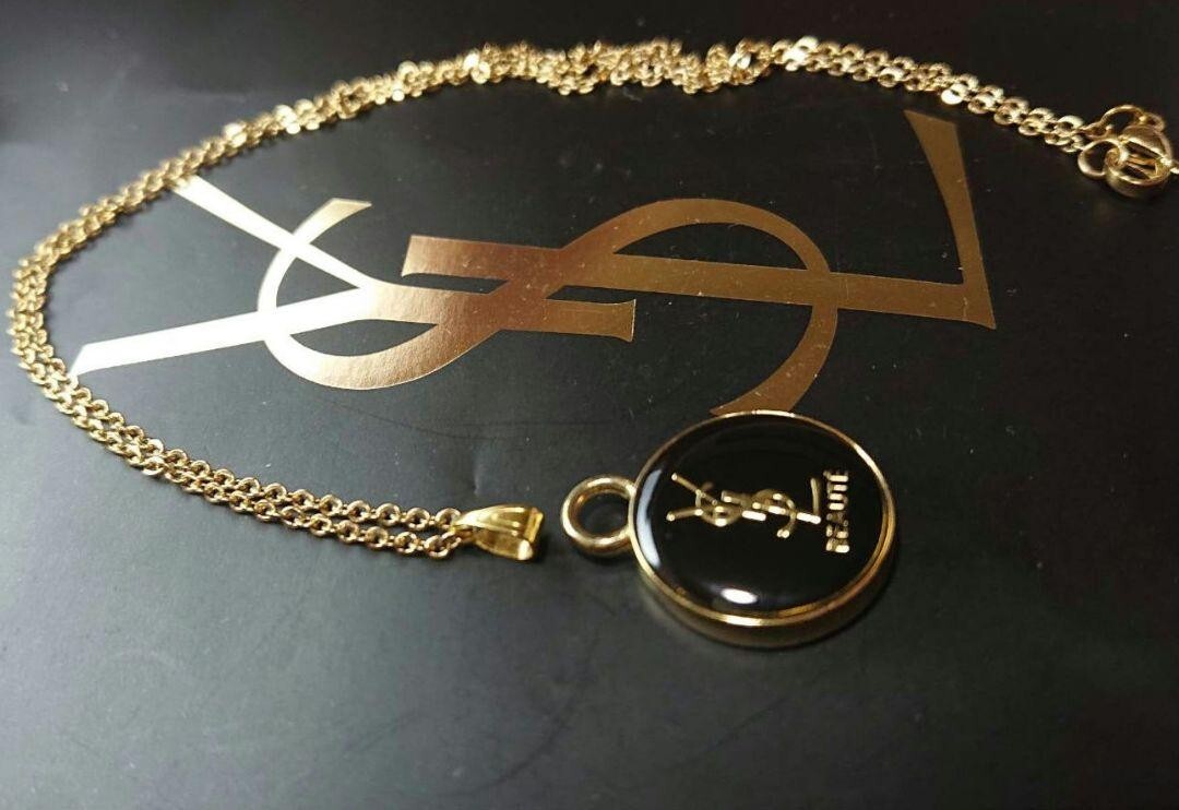 Collana Yves Saint Laurent logo YSL BEAUTE rotonda oro misura catena 50 cm con scatola