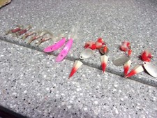 T52    bunch of fishing lures spinners and odd shrimp jigs?