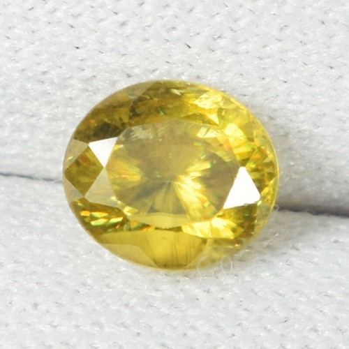0.85 Cts Best Luster Multi Sparkling Natural Sphene Oval....!!!!!! - 第 1/2 張圖片