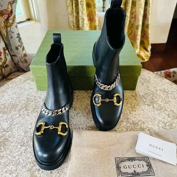 Chaîne en cuir noir Gucci fleurs de boulangerie mollet cheville bottes talon compensé Chelsea