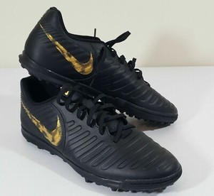 nike tiempo negro con dorado