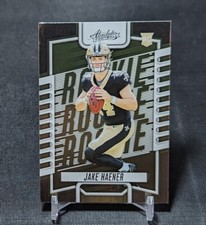 Jake Haener Rookie RC 2023 Absolute Football Card #135 New Orleans Saints. rookie card picture