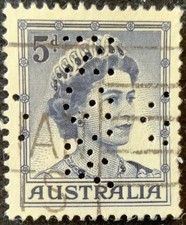 AUSTRALIA 1959 - QUEEN ELIZABETH II - 5d STAMP WITH SPLIT  G/N S W  PERFIN