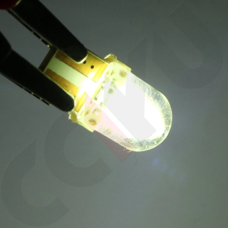 Juego de 20 bombillas de cuña de vidrio brillante Canbus LED de sílice Canbus T10 W5W 194 168 2825 COB para mapa Foto 2 de 4