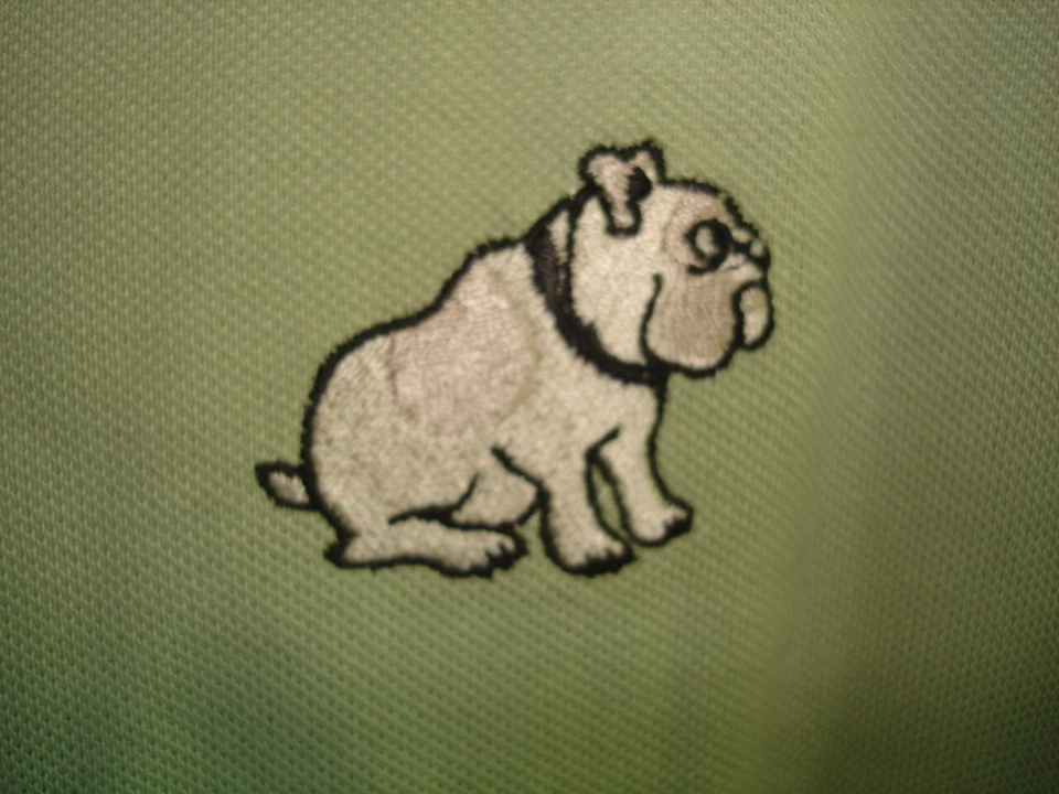 Camisa Polo Greg Norman Verde Sólido con Bulldog Bordado 100% Algodón Piqué S/S L Foto 2 de 4