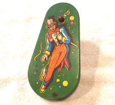 Vintage TIN TOY NOISE MAKER New Year's Eve Party, Metal Spin Rattle, Dancing man