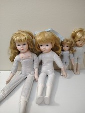 Vintage Porcelain Dolls Lot of 4 different styles sizes No clothes.