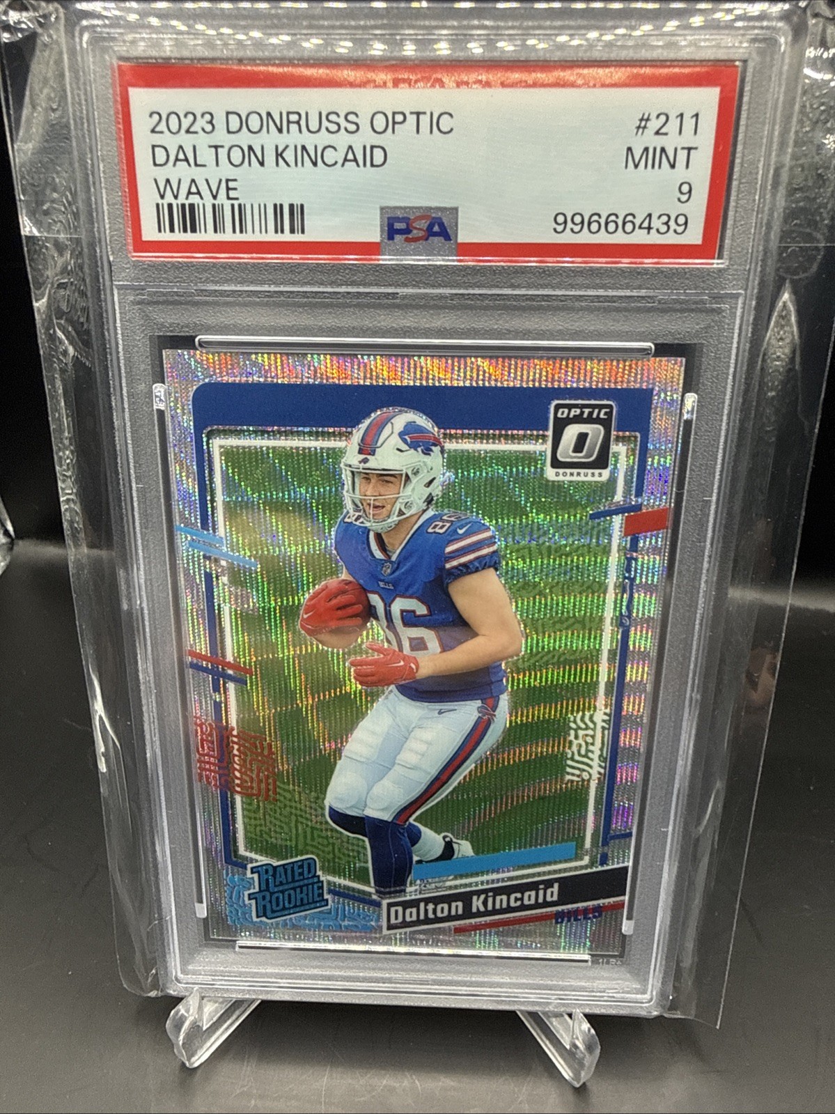 2023 Donruss Optic Rated Rookies /300 Wave Prizm #211 Dalton Kincaid RC SP PSA 9