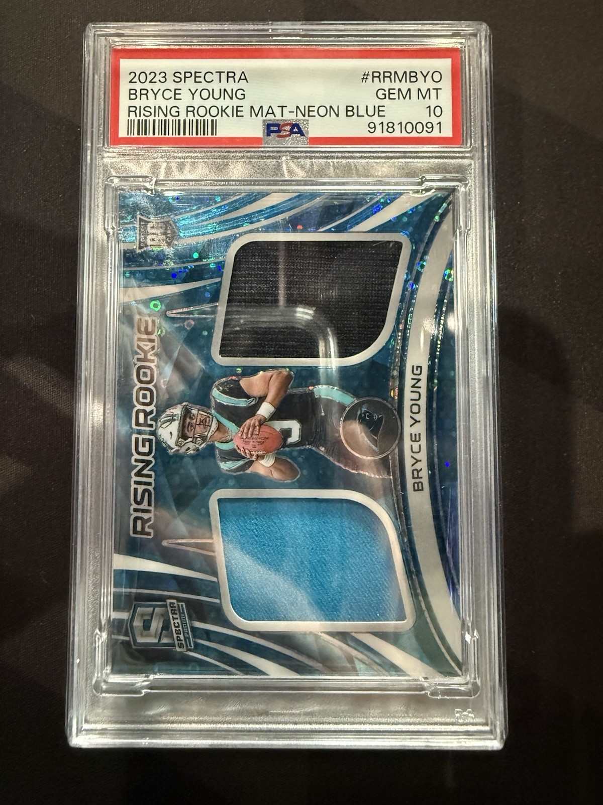 Bryce Young Panini Spectra Rising Rookie Materials #RRMBYO Neon Blue