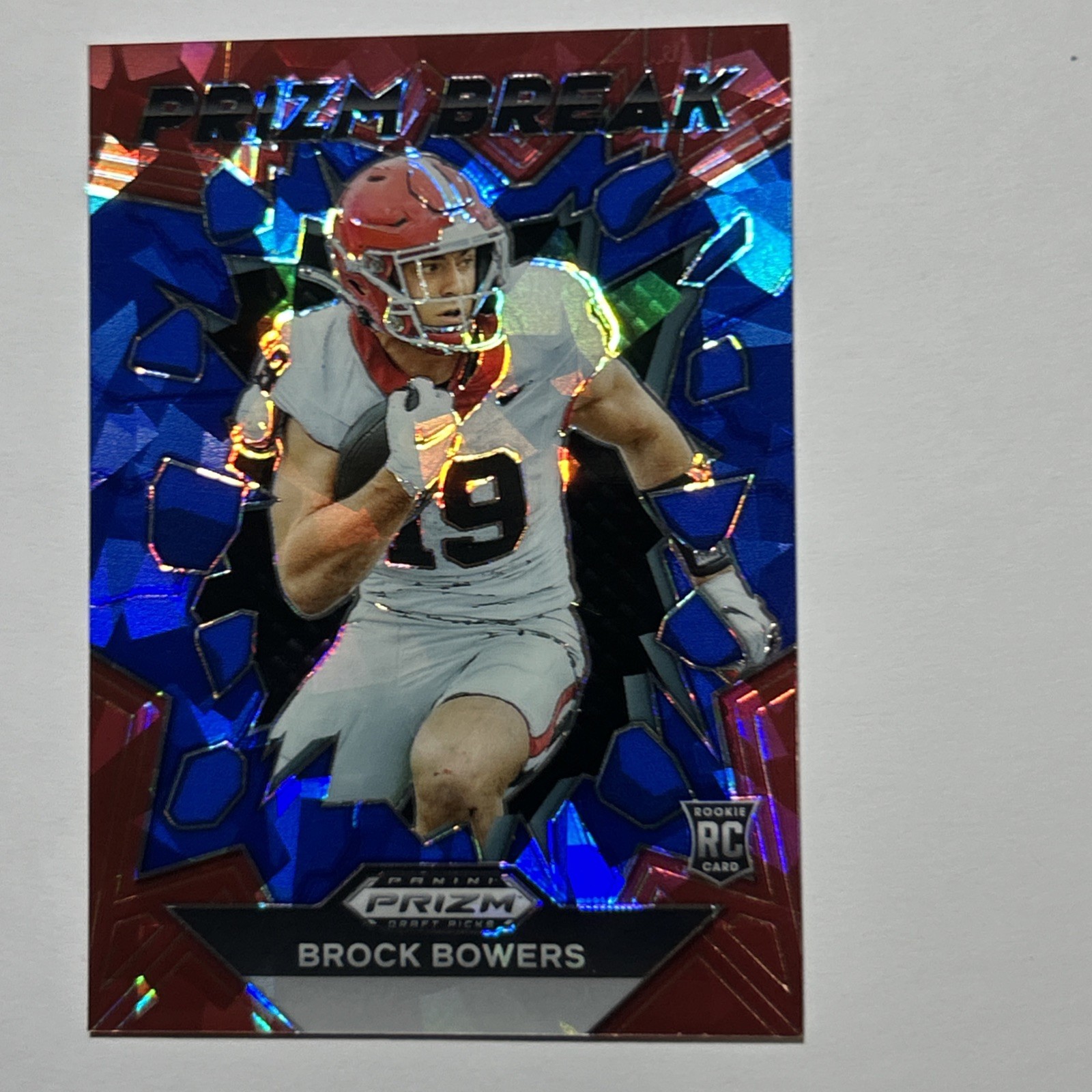 2024 Panini Prizm Draft Brock Bowers Prizm Break Blue Ice Rookie #/99 Raiders RC