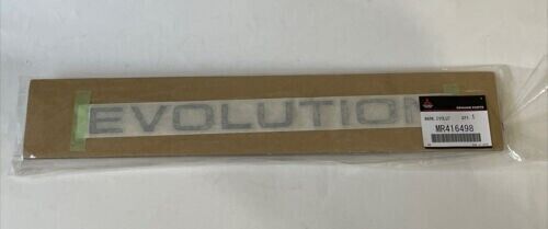 Mitsubishi MR416498 Pajero EVOLUTION REAR letters MR416498 97150 OEM - Picture 1 of 5