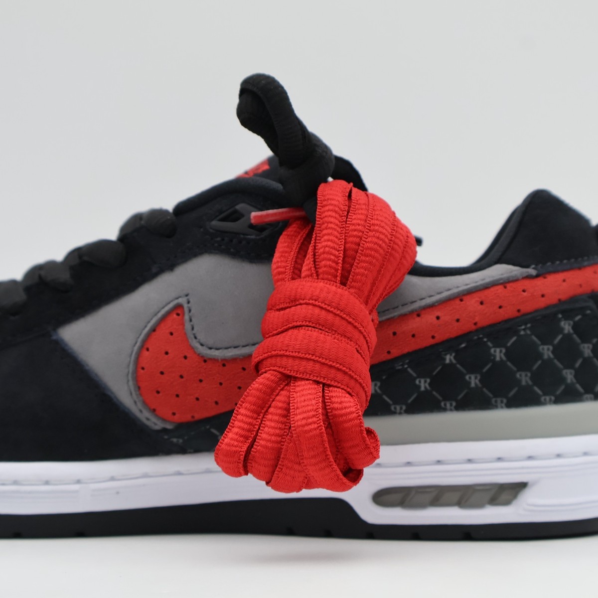 IM7147-001 Nike SB Paul Rodriguez Low Bred Black and Flint Grey