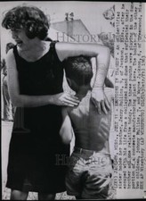 1963 Press Photo Jerry Mullins with his sister after escaping from sand dune