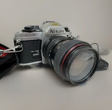 Excellent Nikon FG-20 FG 35mm SLR Film Camera 28-70 F/4.5 Zoom Lens TESTED