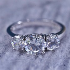 Size 6.25, vintage Sterling 925 silver engagement ring with Cz around