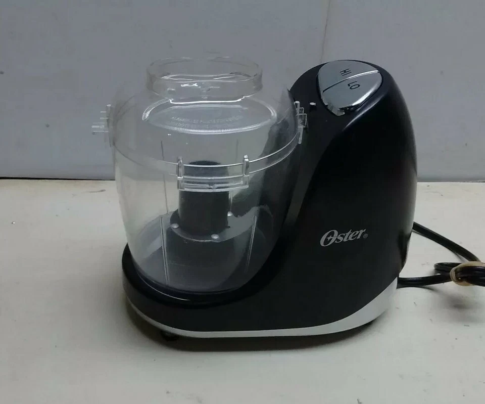 Mini comida Oster Chopper 3 tazas dos velocidades negra Foto 3 de 4