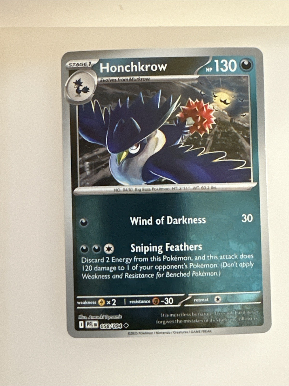 Honchkrow 058/094 Me02: Phantasmal Flames Reverse Holo