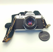 Pentax K1000 Silver 35mm SLR Film Camera w/ SMC Pentax-M 50mm f/2 Lens CLA'd