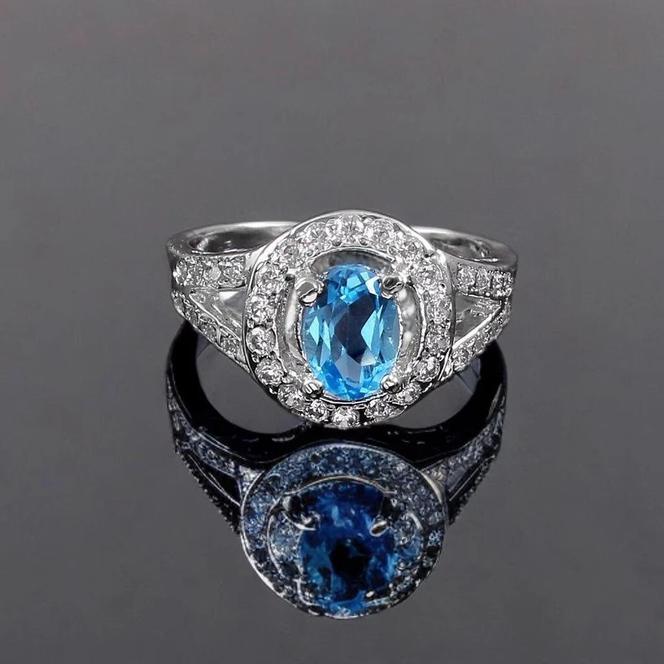 Anillo de plata esterlina con topacio azul | Anillo de compromiso y boda único para mujer” Foto 4 de 4