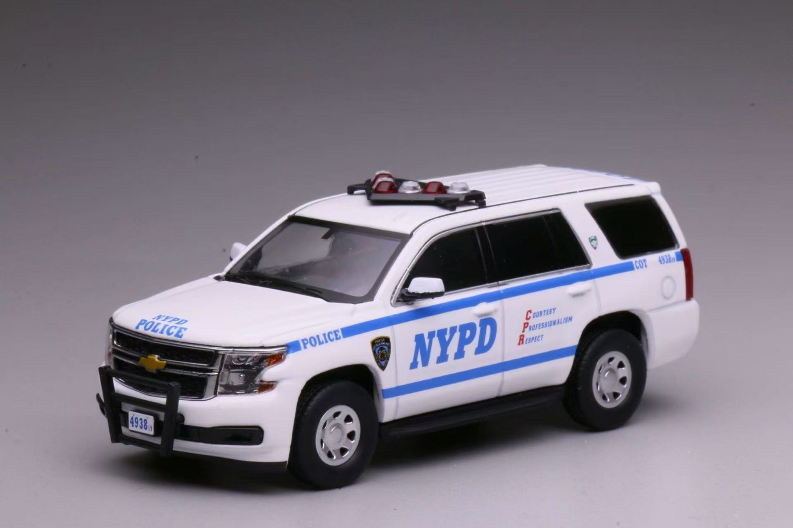 596 1: 64 Chevrolet Tahoe New York Police Car Diecast Collect Car