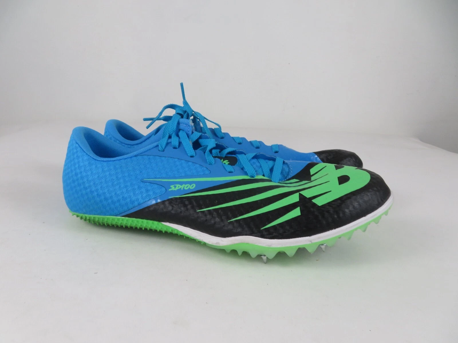 New Balance SD100 v4 scarpe basse da corsa 12 piste blu nero punte