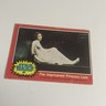 1977 Star Wars trading card #89 The Imprisoned Princess Leia