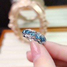 2 Ct Oval Cut Simulated Blue Topaz Eternity Wedding Ring 14k White Gold Plated
