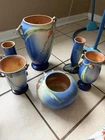 These items appear to be vintage Roseville Art Pottery pieces in the "Pine Cone"