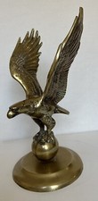 Vintage Brass Eagle Figurine Clutching Orb with Outstretched Wings