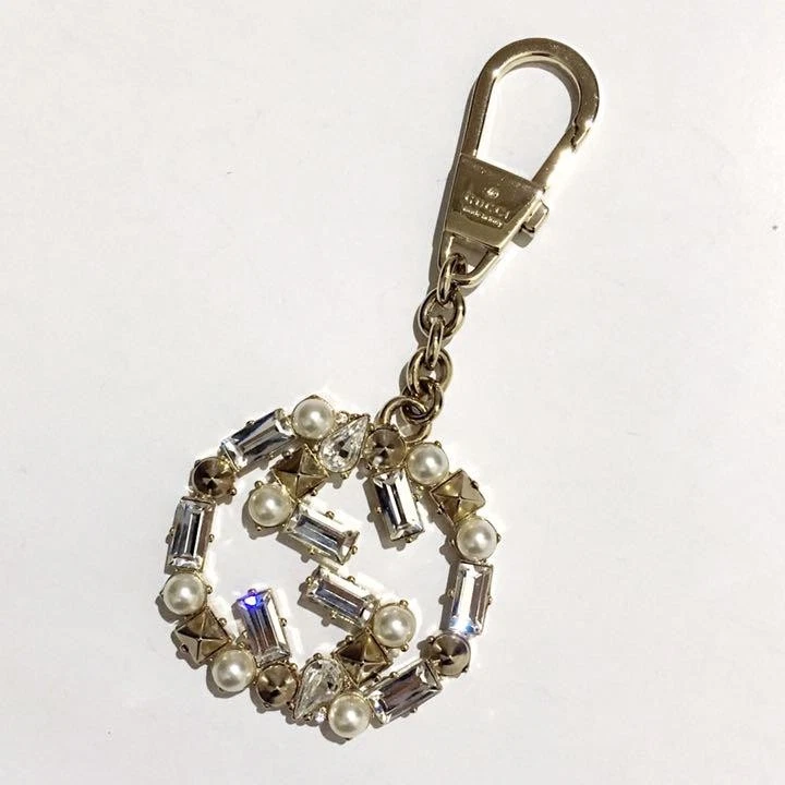 Gucci Bijou Porte clés Doré Sac Charm avec Perles et Clous   Occasion