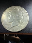 1926-S peace silver dollar VF+.                                               64