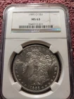 1885-O Morgan Silver Dollar, Uncirculated, NGC MS 63, New Orleans Mint, $1