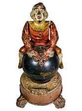 1890s CAST IRON MECHANICAL BANK - THE CLOWN ON GLOBE BANK BY J. & E. STEVENS