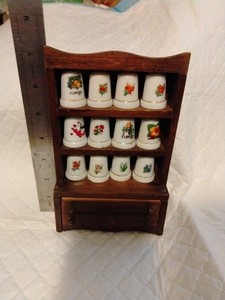 Small Vintage Cabinet With Porcelain Thimbles