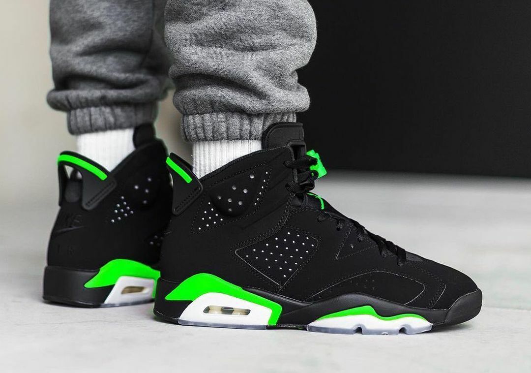 black and electric green jordans